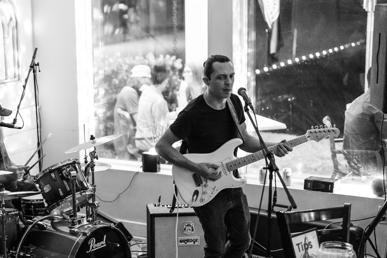 The band set up in a small room